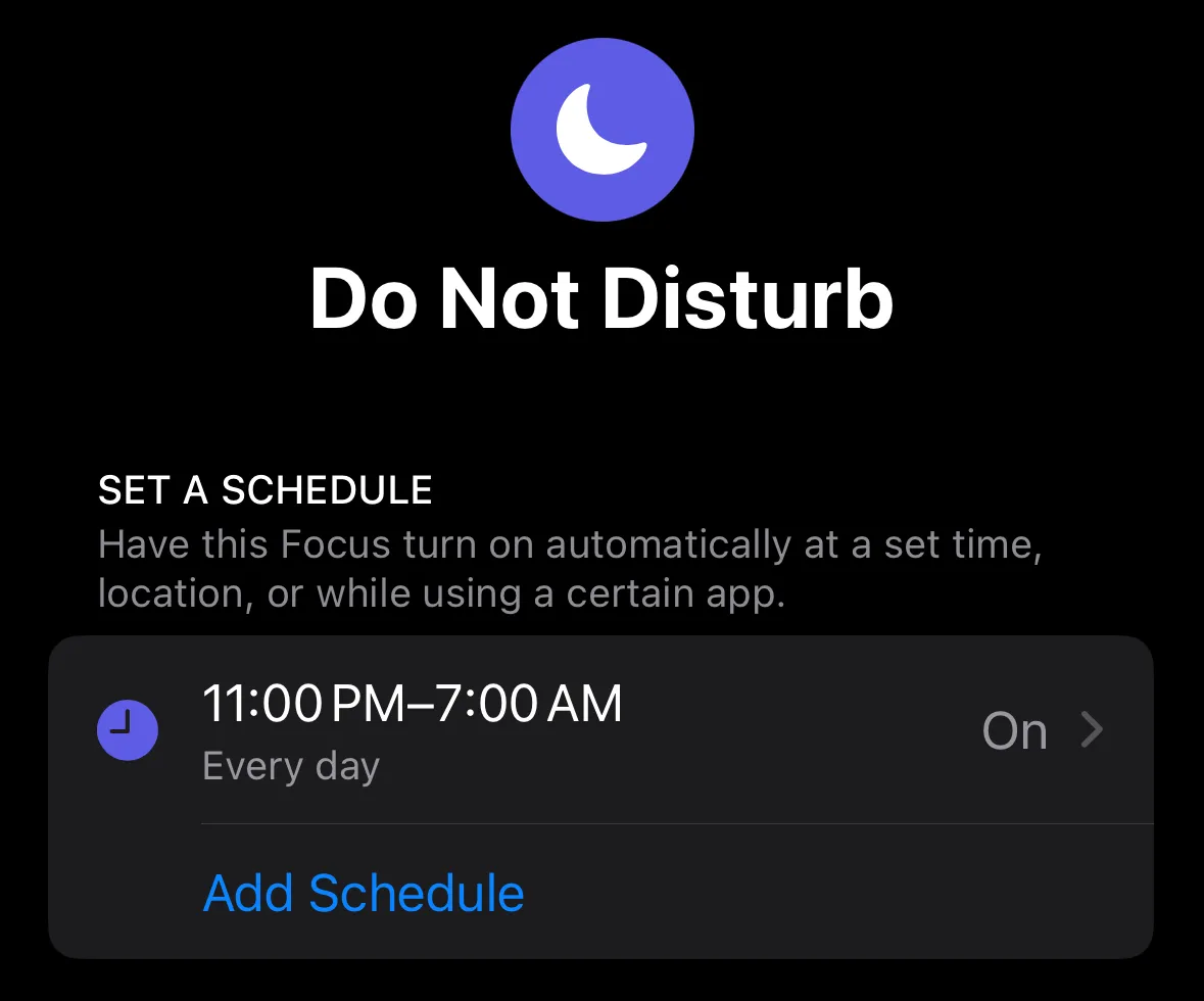 iPhone Focus settings screen showing a do-not-disturb schedule between 11pm and 7am every day.